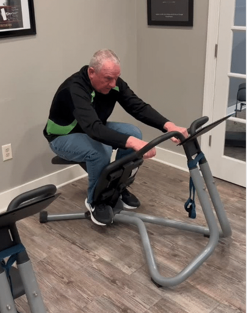 Patient performing corrective physical therapy exercises at Life Source Chiropractic