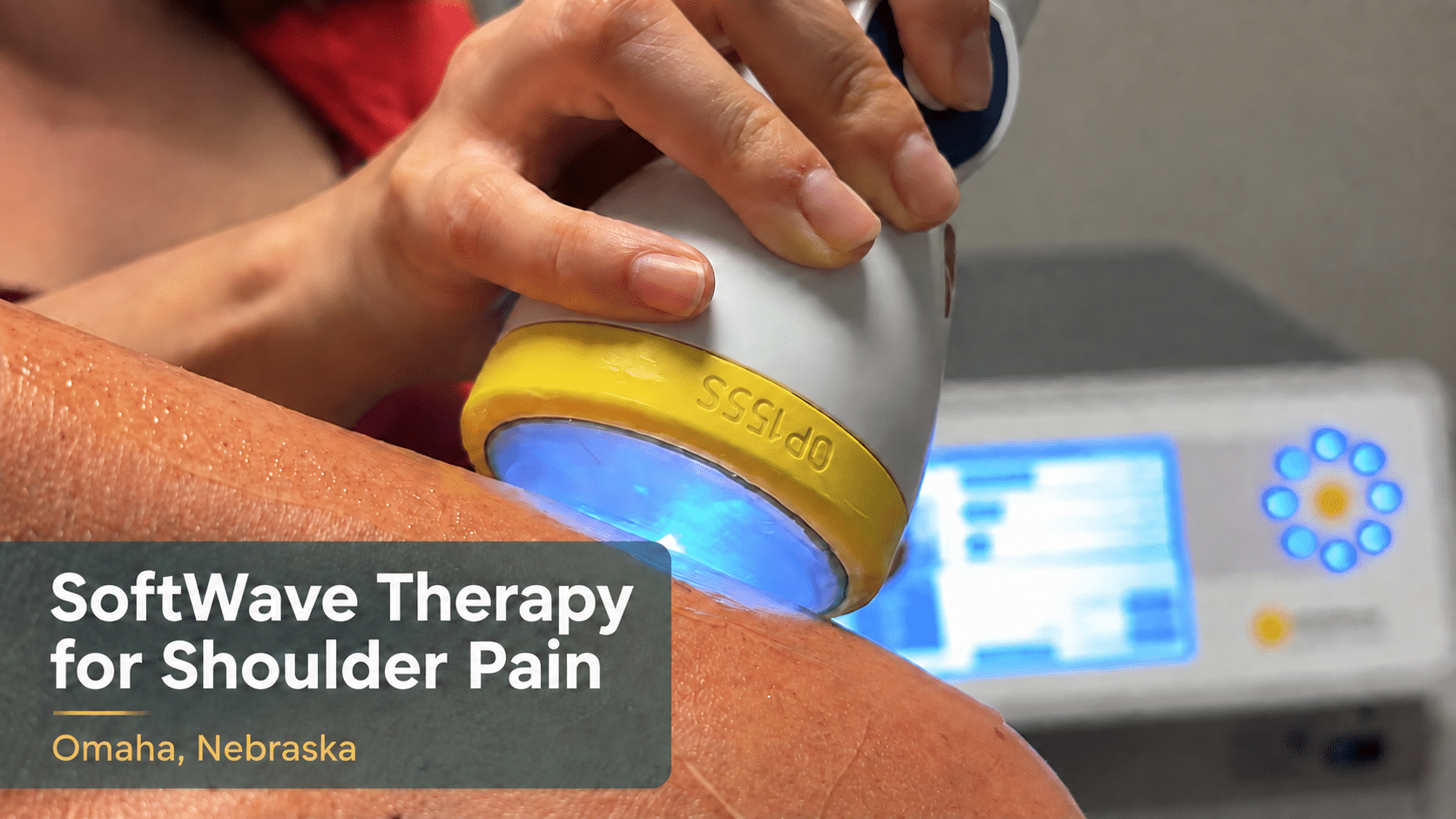 SoftWave Therapy being applied to a shoulder at Life Source Chiropractic in Omaha